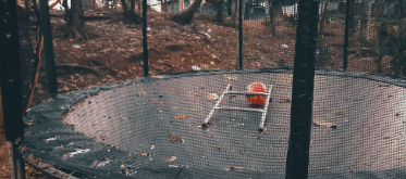 child jumping on trampoline in dream